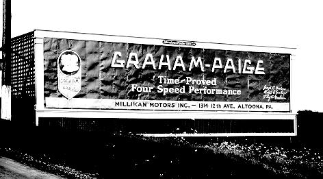 [PIC: MILLIKAN MOTORS BILLBOARD]